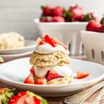 A vegan strawberry shortcake on a plate.