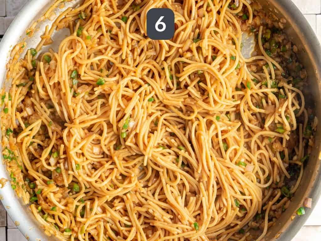 Spicy Garlic Noodles Step 6 - add the pasta to the sauce.