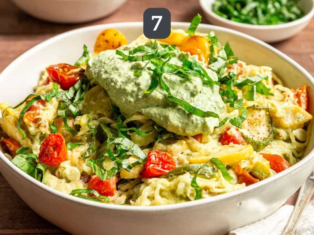 Pesto spaghetti squash served with fresh basil.