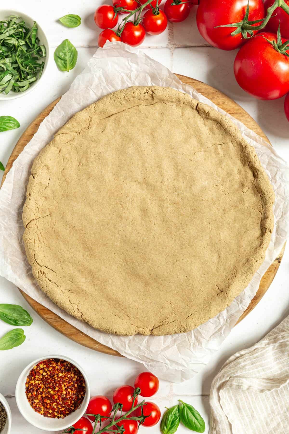 Oil-Free Vegan Oat Flour Pizza Crust baked and ready to add toppings.
