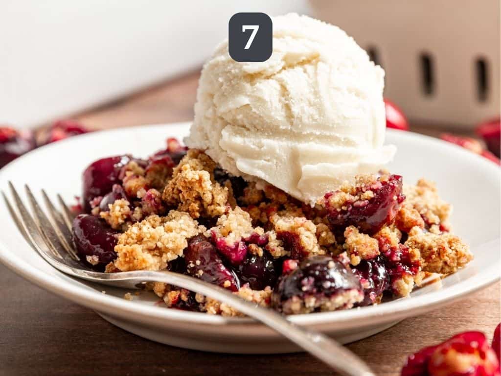 Vegan Cherry Crumble Step 7 - serve with ice cream.