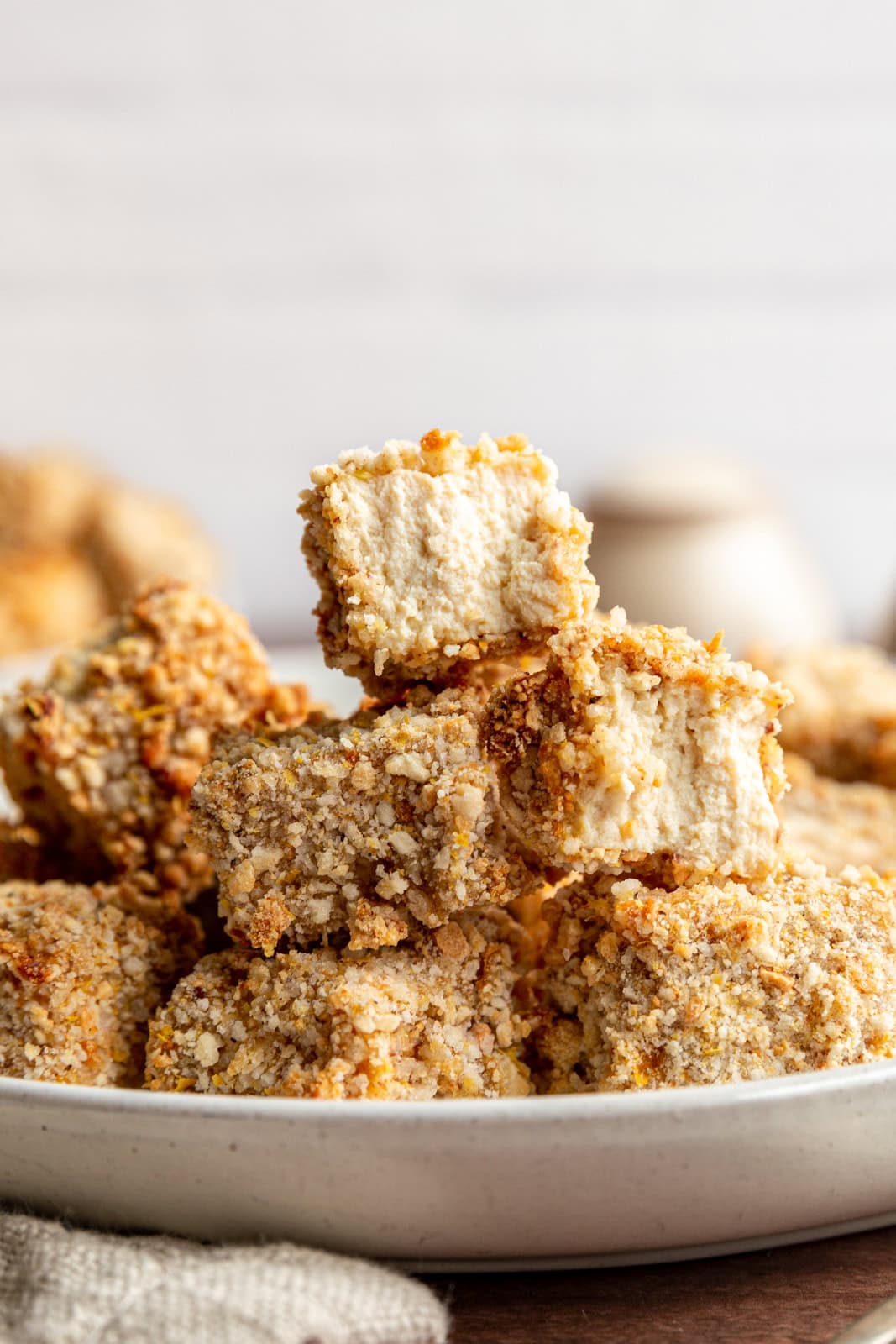 Air Fryer Tofu Nuggets stacked on top of each other.