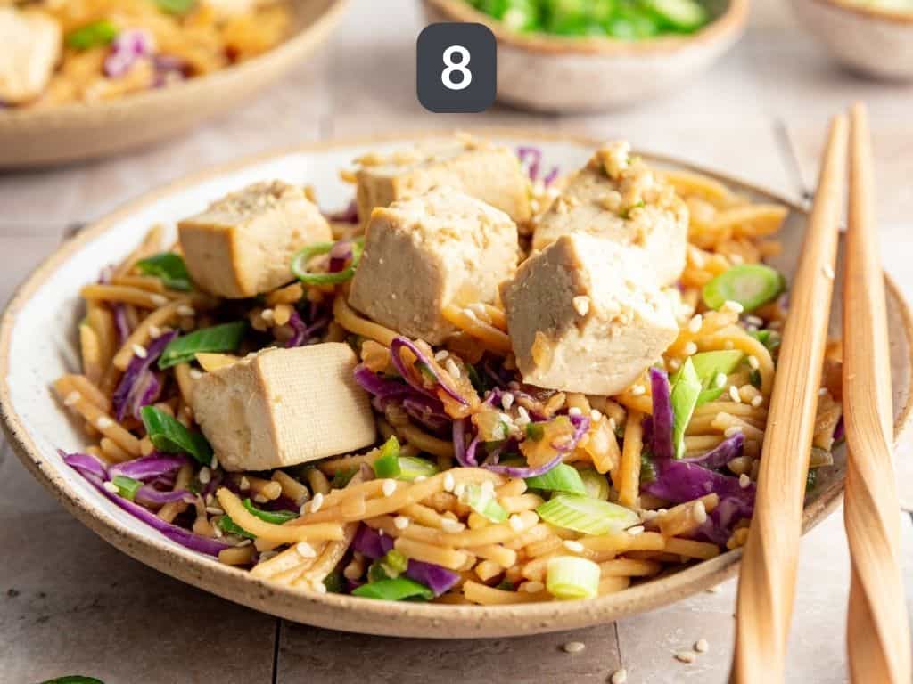Spicy Garlic Noodles Step 8 - serve topped with tofu.