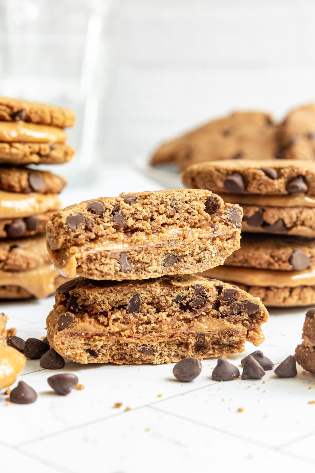 Several stacks of Vegan Peanut Butter Sandwich Cookies.
