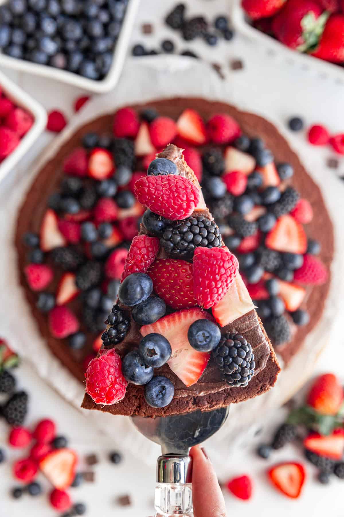 A slice of Vegan Chocolate Fruit Pizza.
