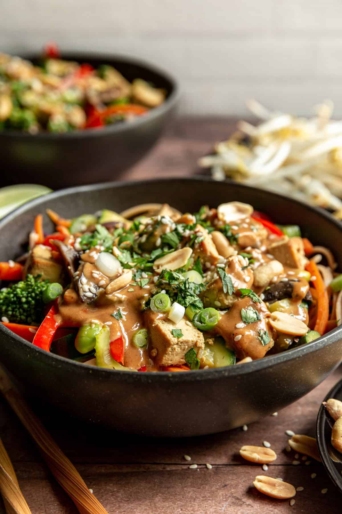 Vegan Oil-Free Pad Thai in a bowl with chopsticks on the side.