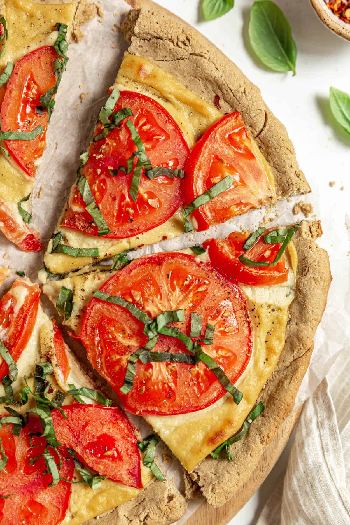 Two slices of Vegan Margherita Pizza.