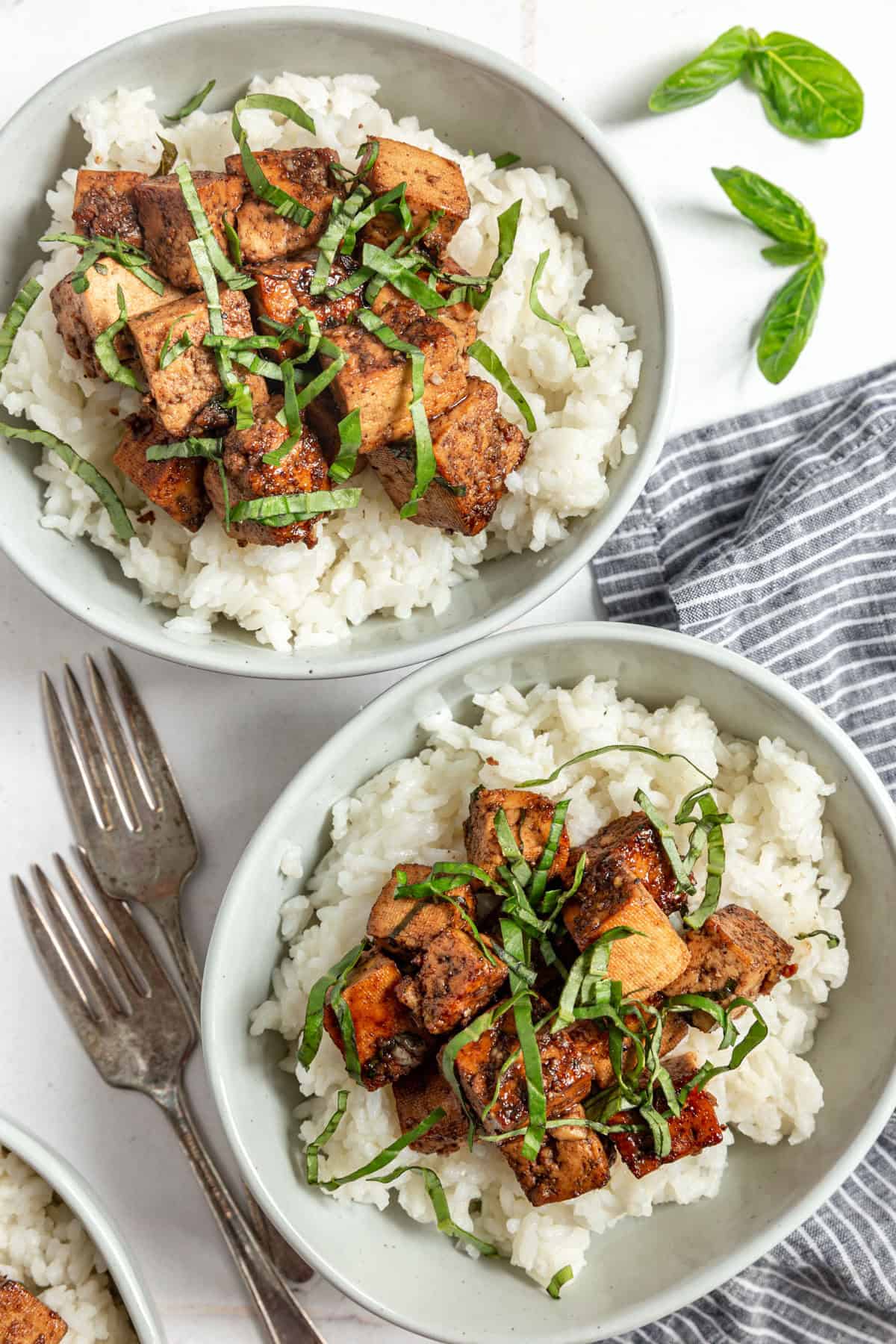 Two bowls of Basil Balsamic Marinated Tofu ready to serve.