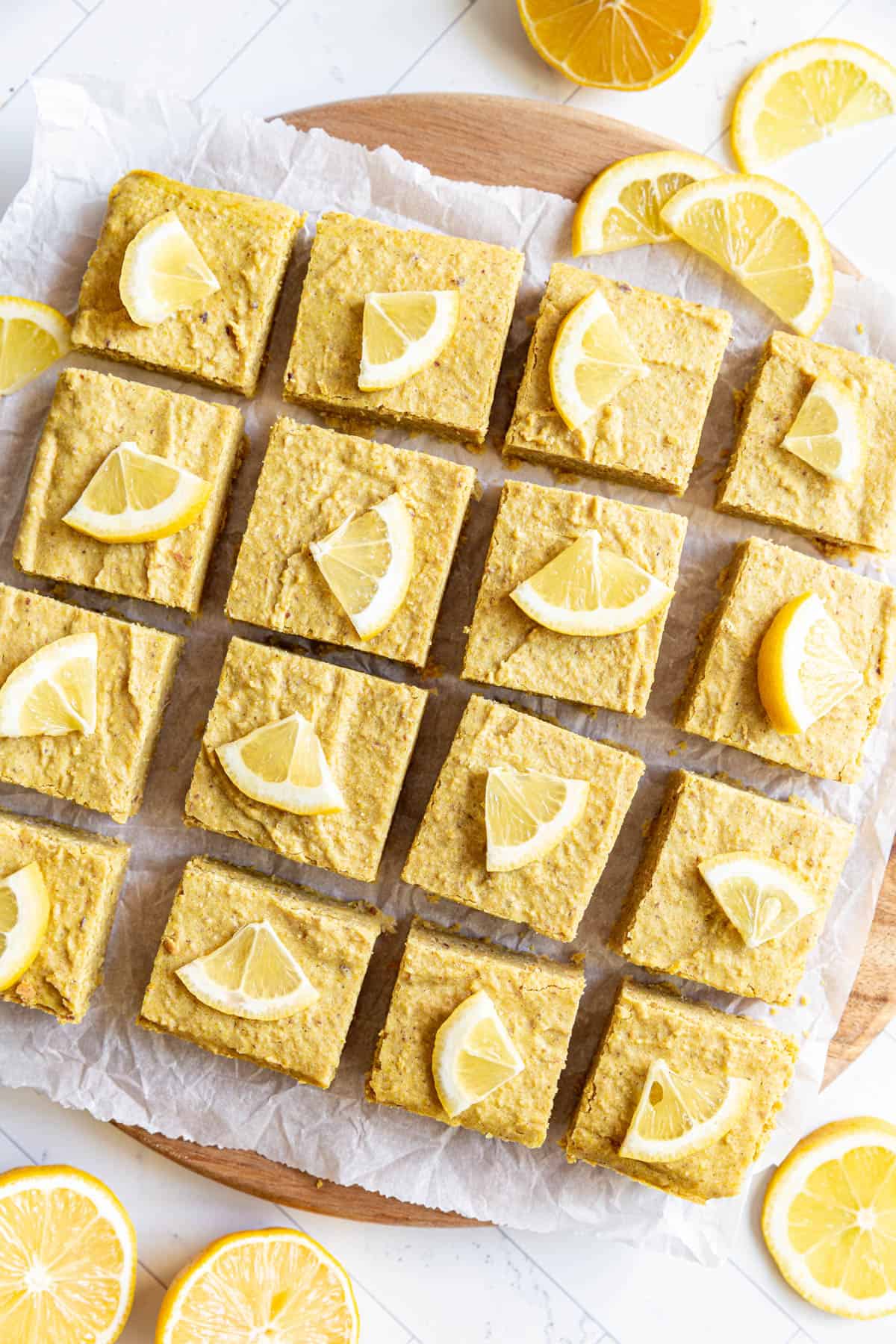 A tray of Vegan Lemon Brownies topped with lemon slices.