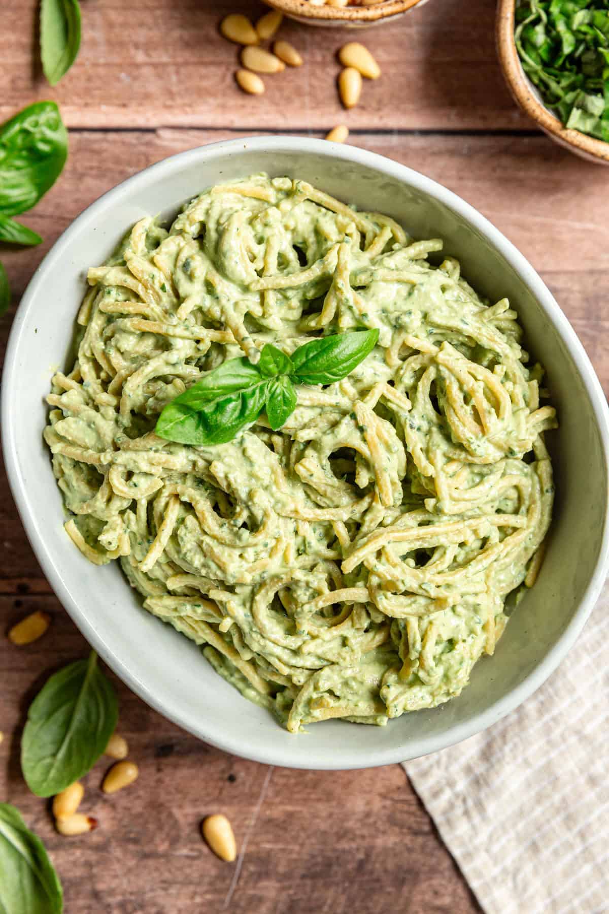 A bowl of pasta tossed with tofu pesto sauce.
