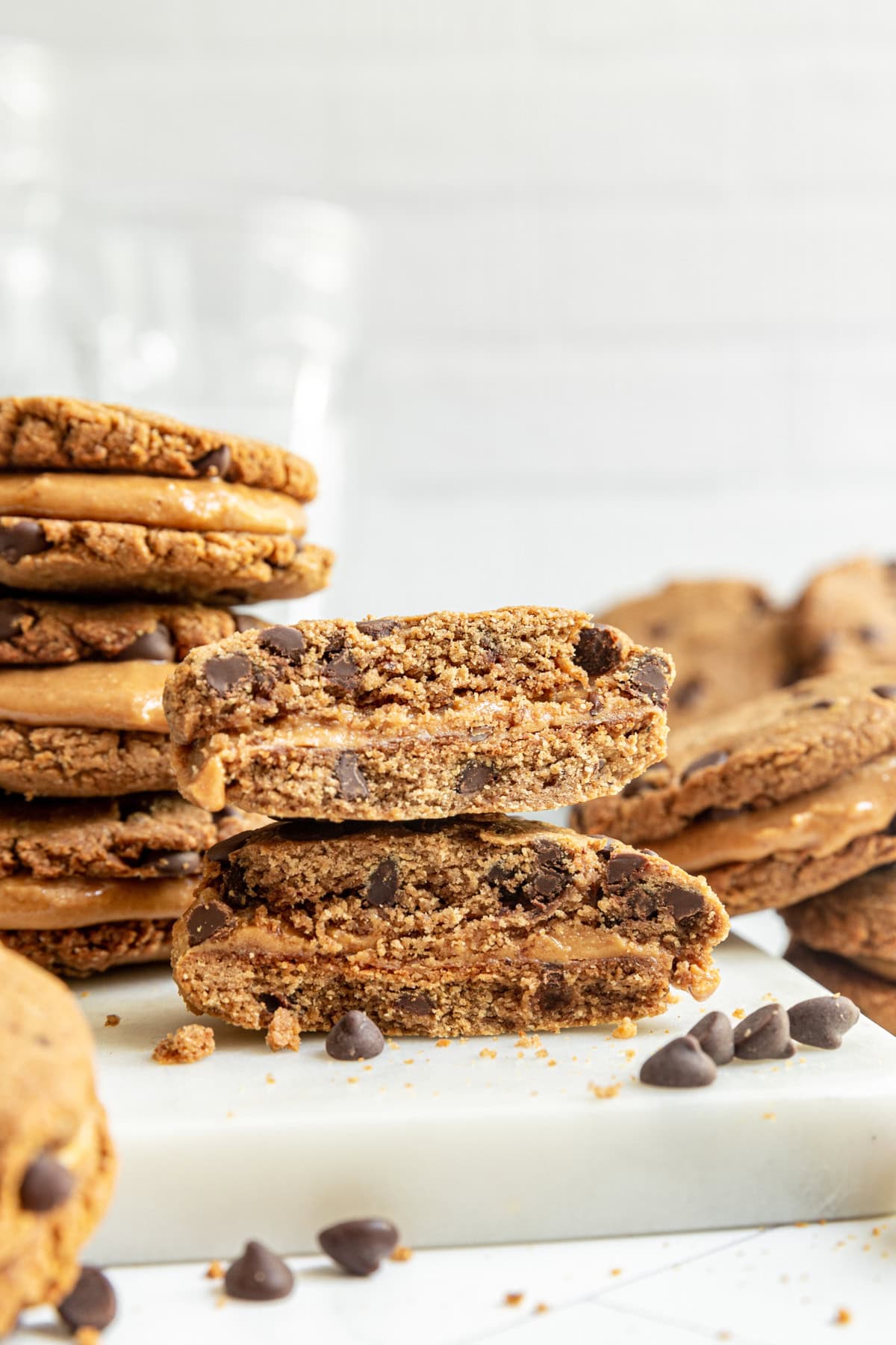 A Vegan Peanut Butter Cookie Sandwich cut in half.