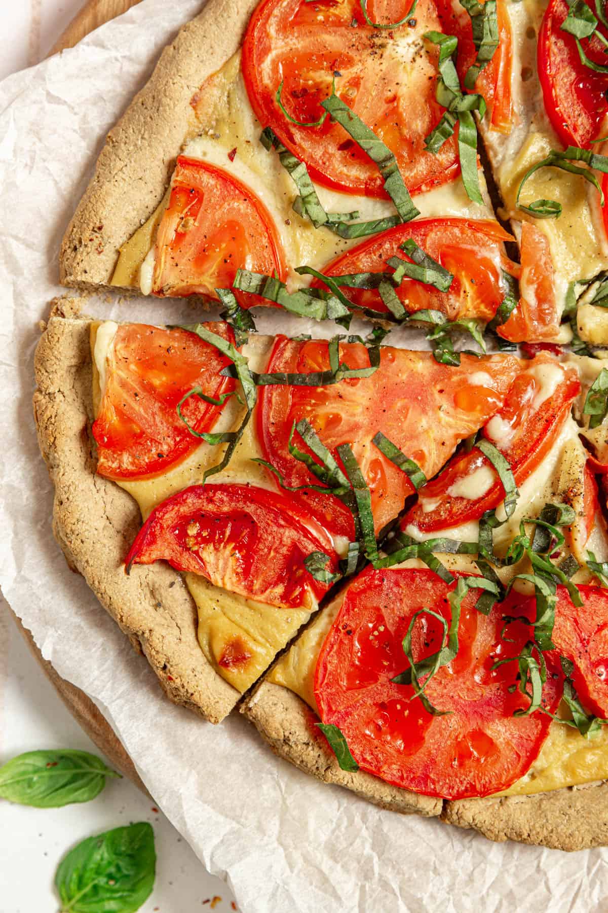 A sliced Vegan Margherita Pizza.