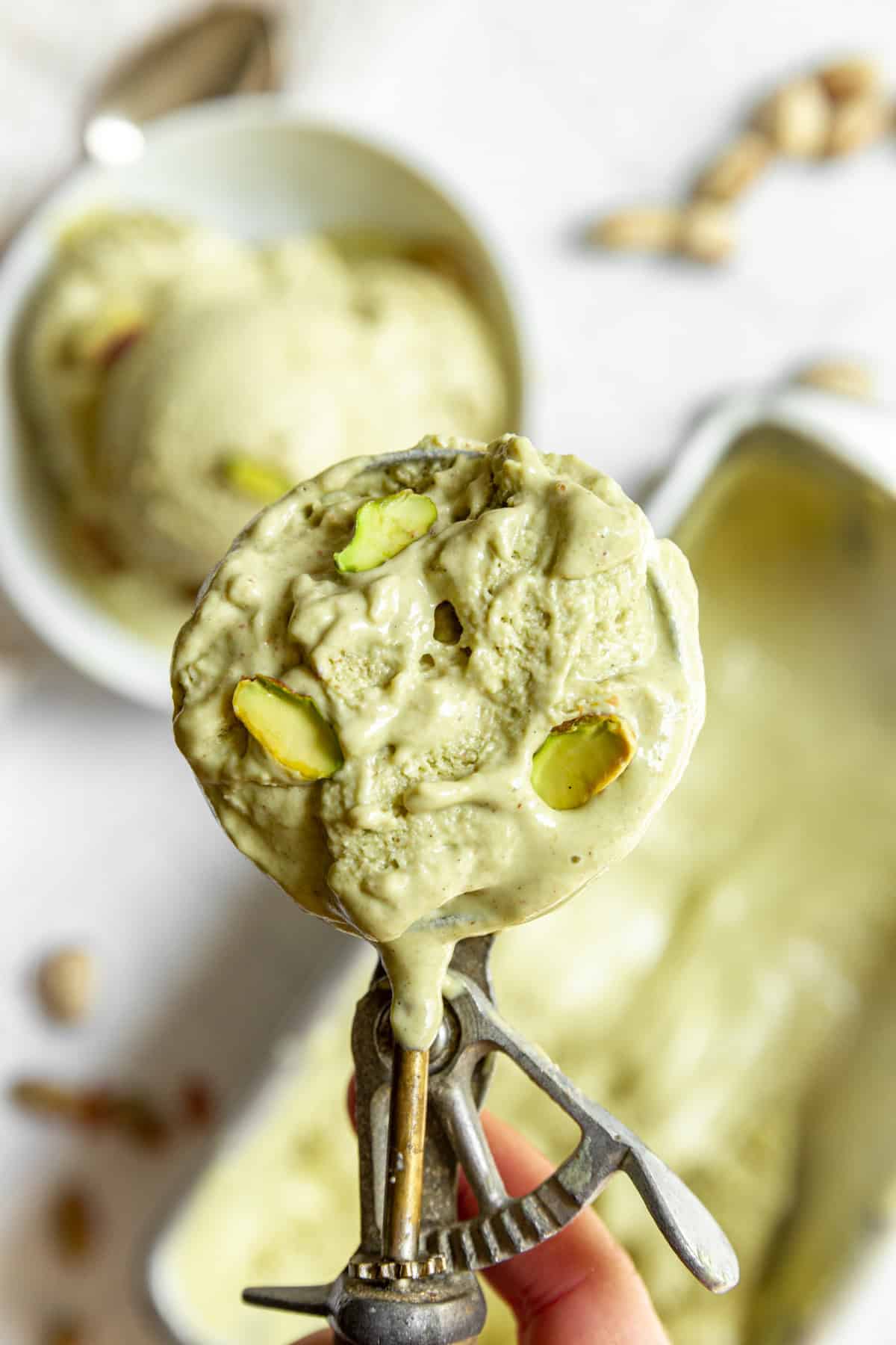 A scoop of Vegan Pistachio Ice Cream.
