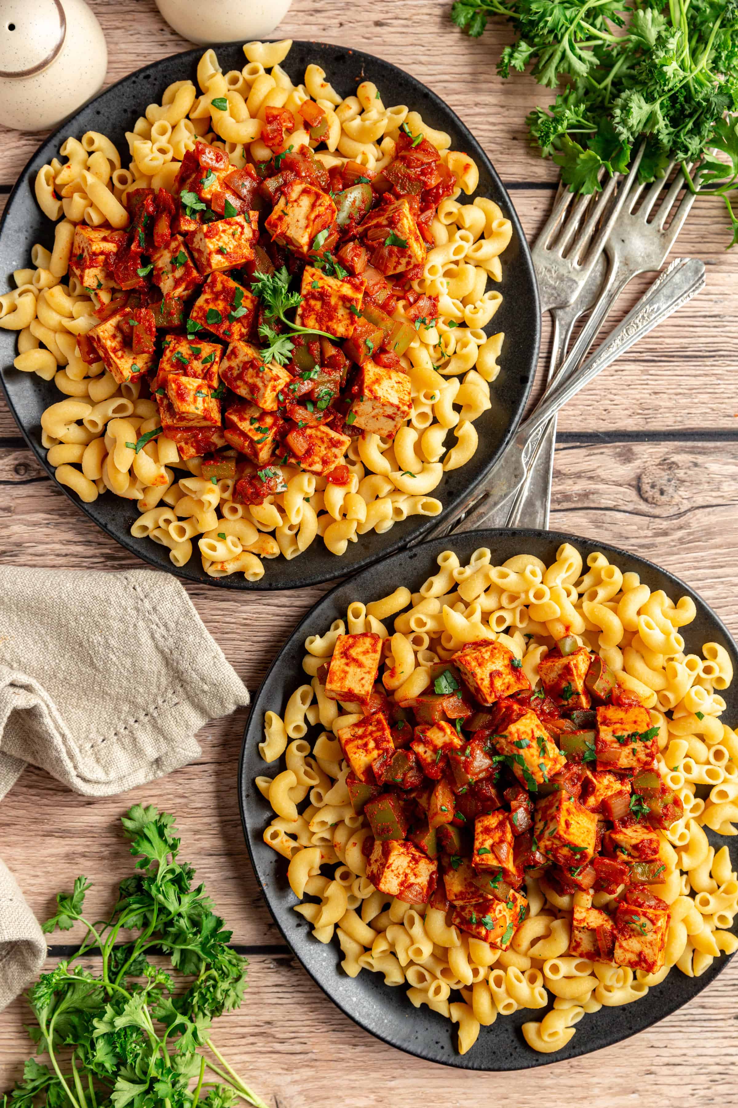 Two plates of Vegan Paprikash with Tofu.