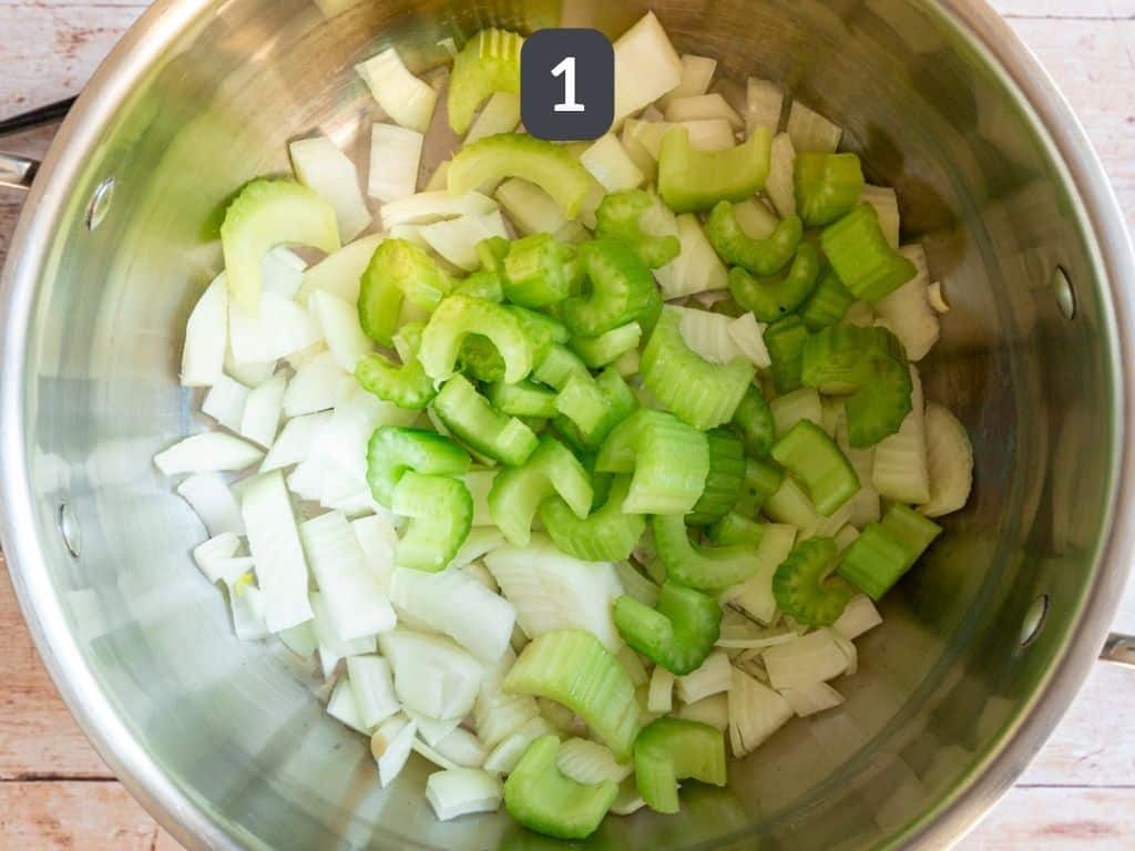 Creamy Cauliflower White Bean Soup Step 1 - cook the onion and celery.