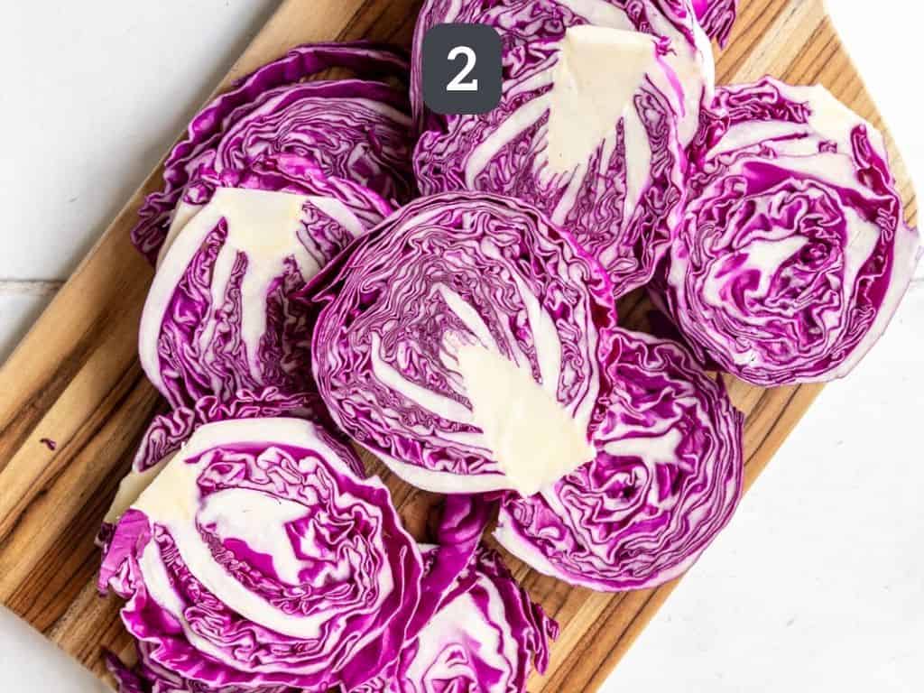 Red Cabbage Steaks Step 2 - slice the cabbages into steaks.