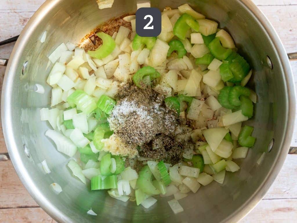 Creamy Cauliflower White Bean Soup Step 2 - add the herbs and spices.