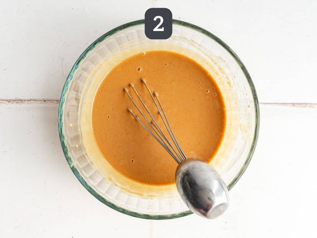 Healthy Peanut Sesame Dressing Step 2 - whisk to form a sauce, adding water as necessary.