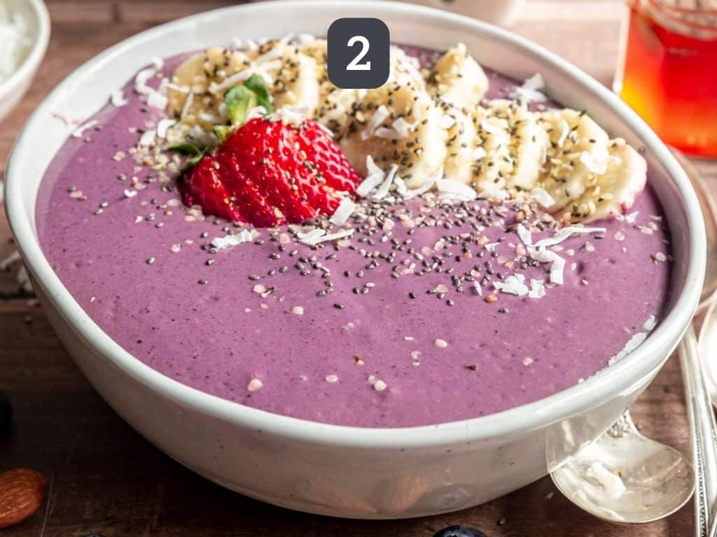 High Protein Acai Smoothie Bowl Step 2 - serve with toppings.