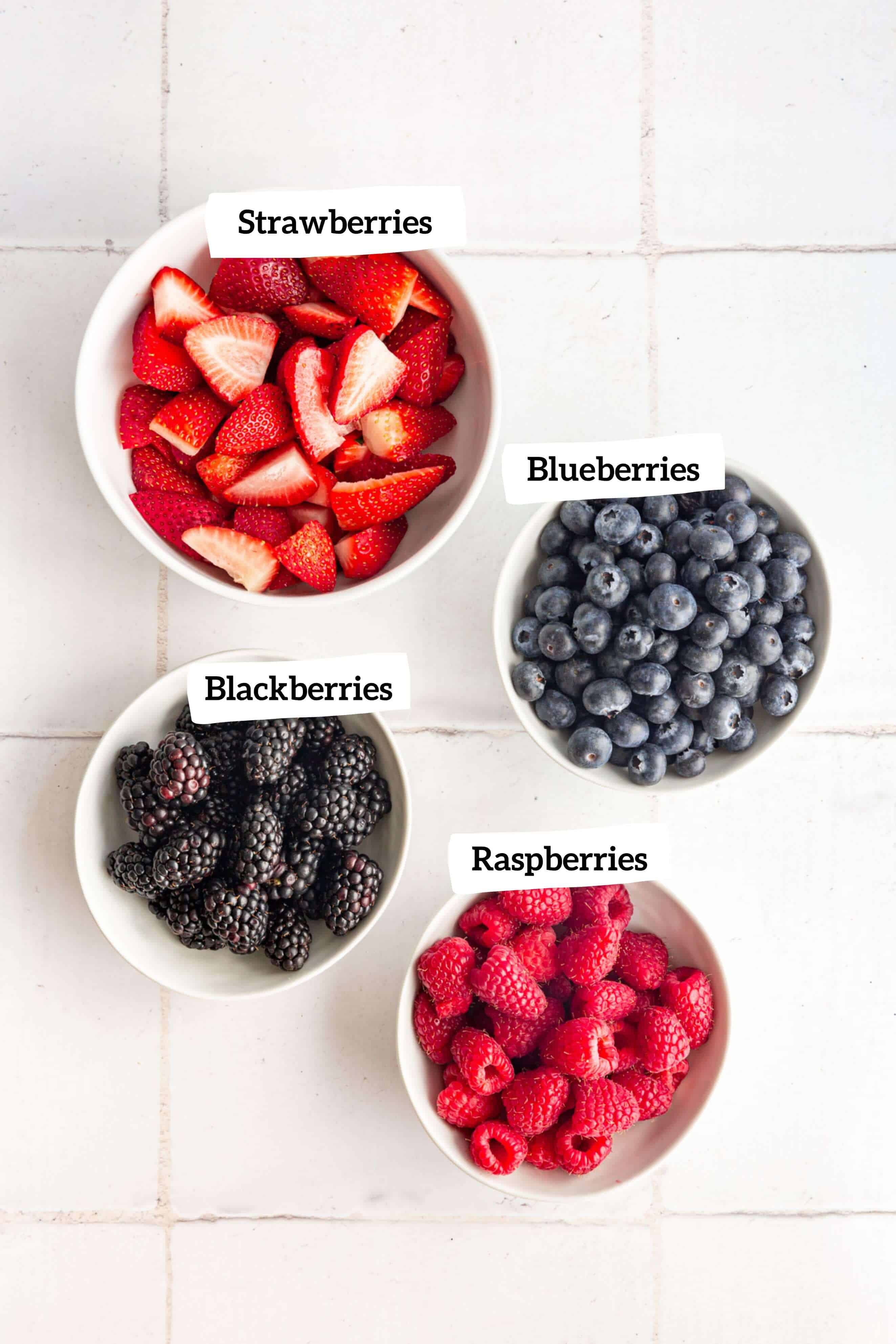 Fresh fruit in bowls, ready for fruit pizza.