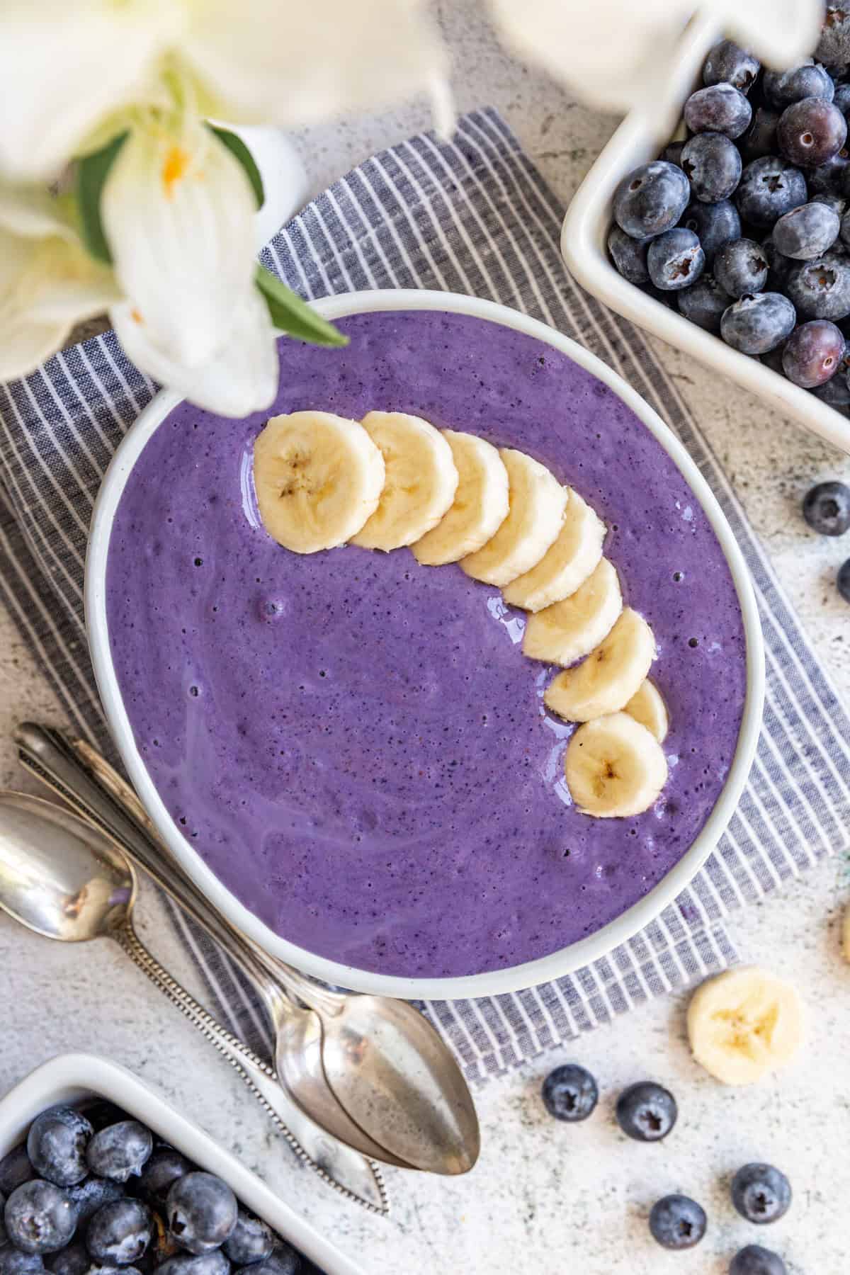 A Silken Tofu Smoothie in a bowl, topped with sliced banana.