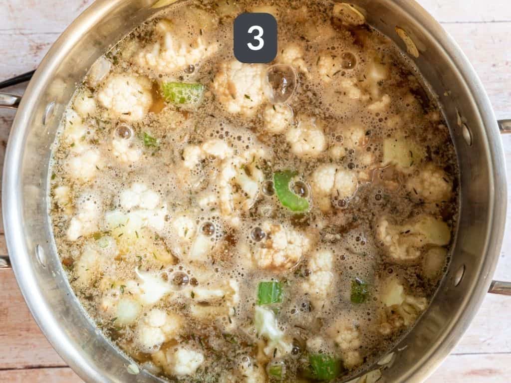 Creamy Cauliflower White Bean Soup Step 3 - add the cauliflower and beans.