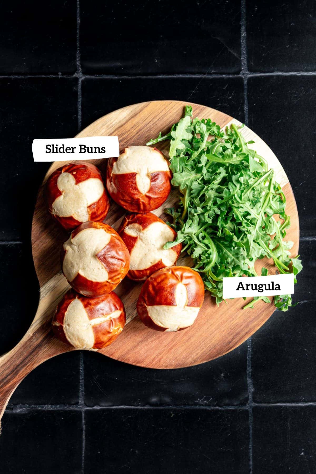 Pretzel buns and arugula.