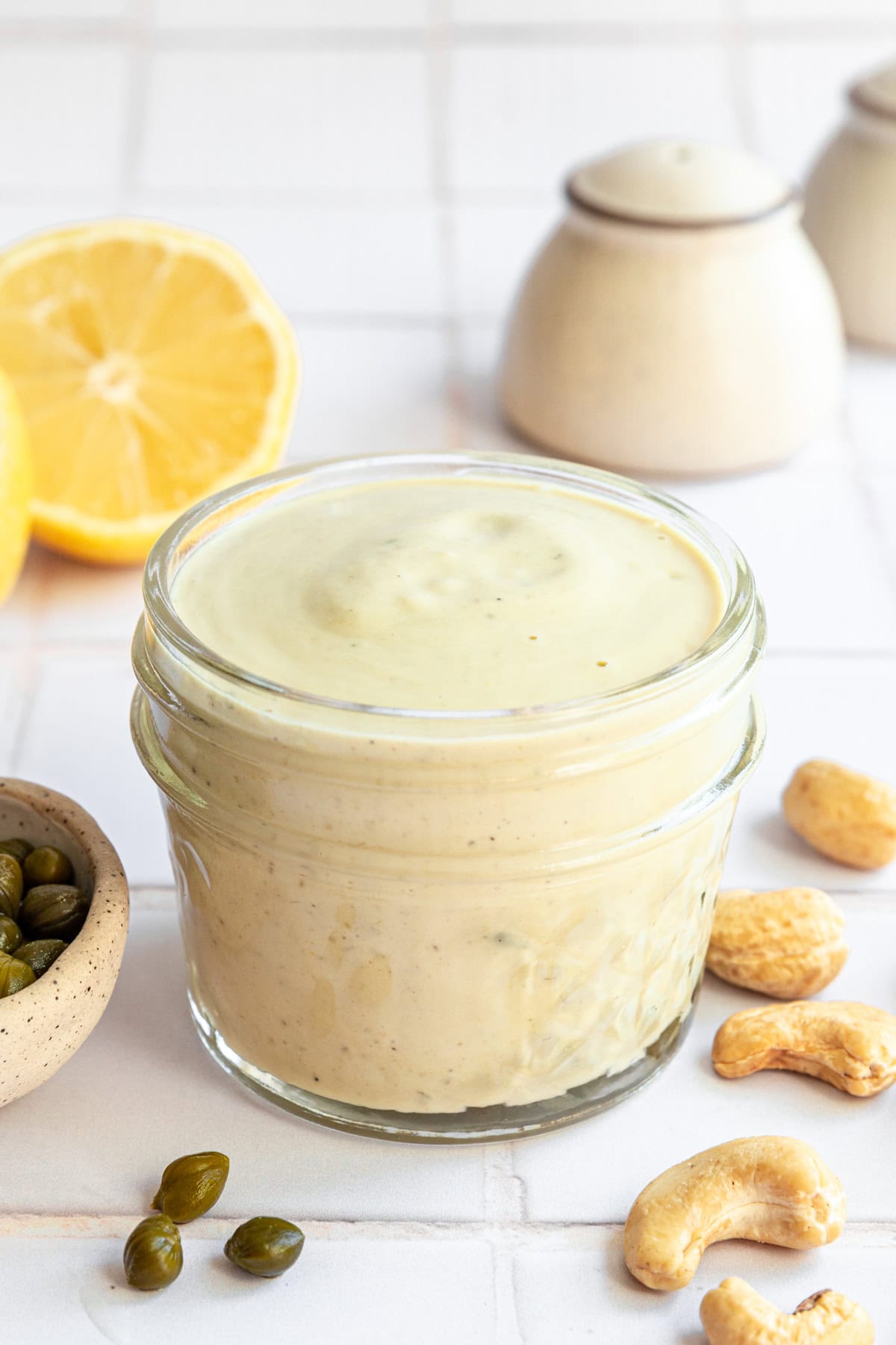 Vegan Oil-Free Cashew Caesar Salad Dressing in a mason jar.
