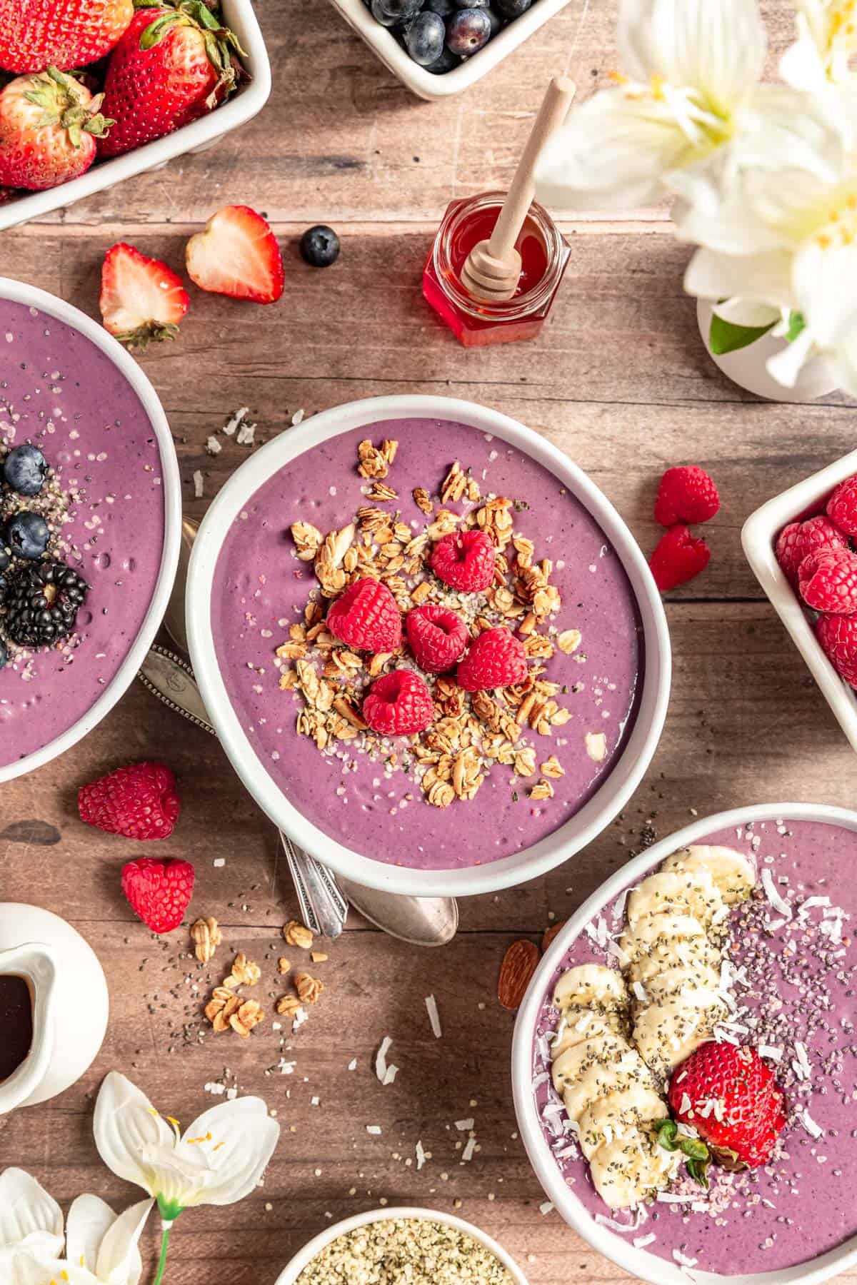 Three acai bowls ready to serve.