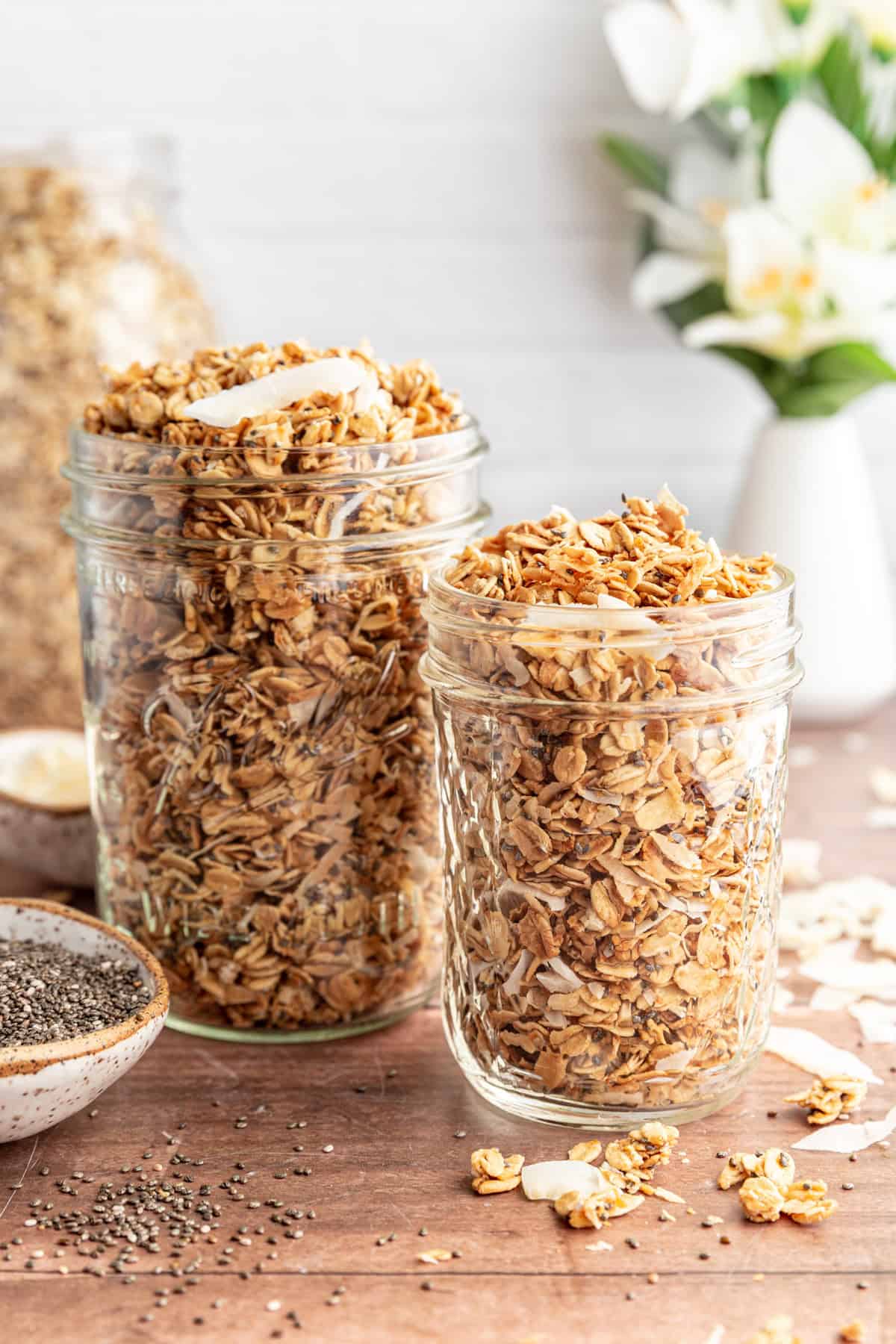 Two jars of Easy Vanilla Coconut Granola.