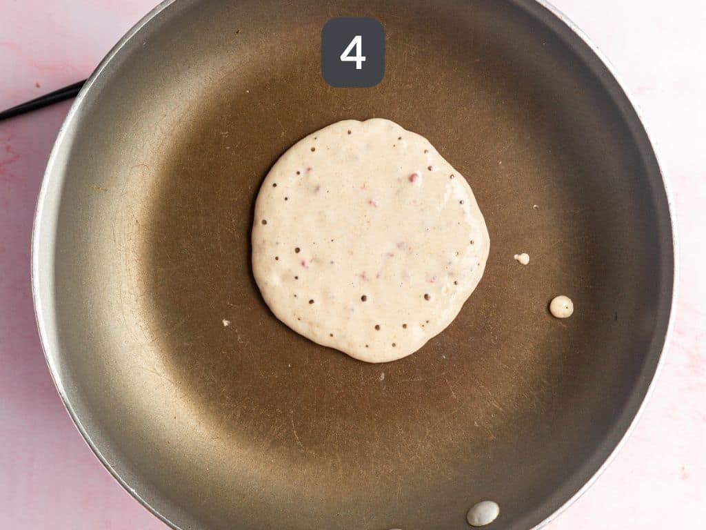 Vegan Raspberry Lemon Pancakes Step 4 - scoop the batter into a pan.