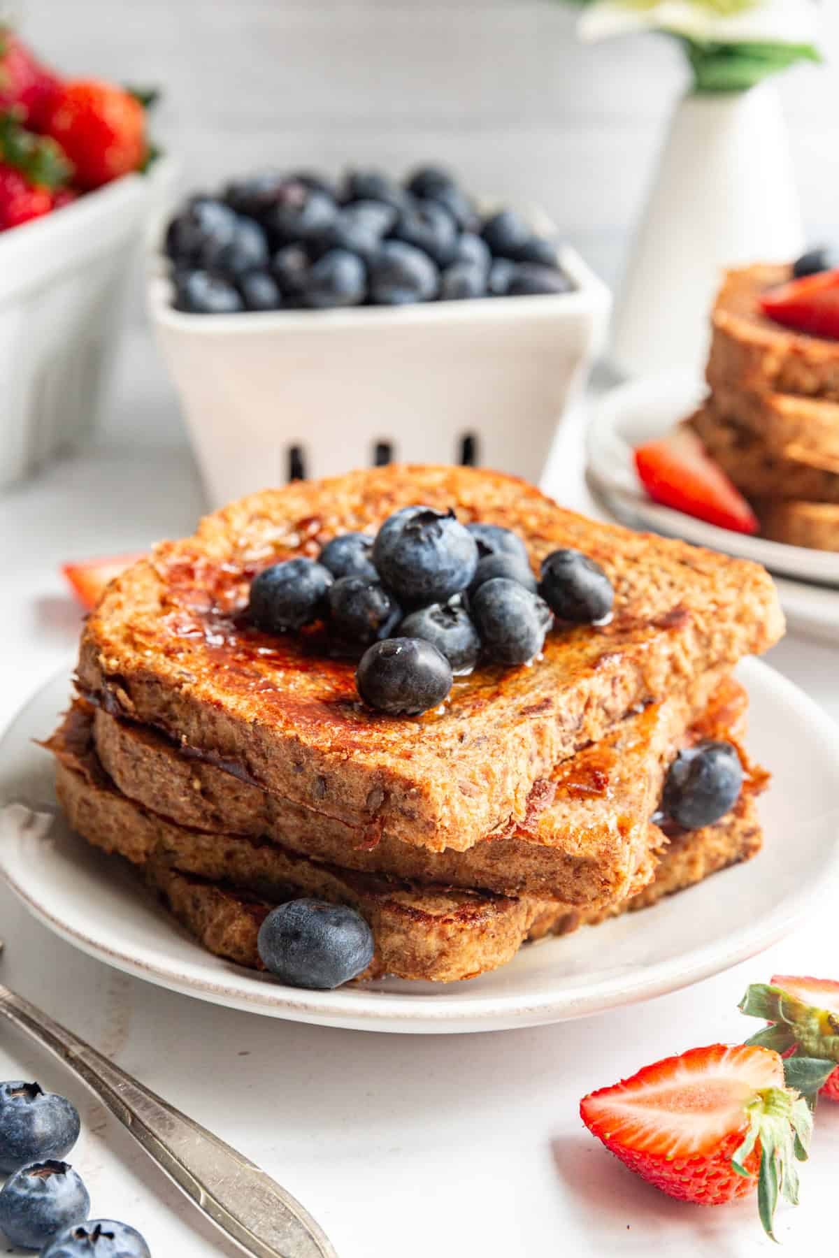 Vegan High Protein French Toast topped with blueberries.