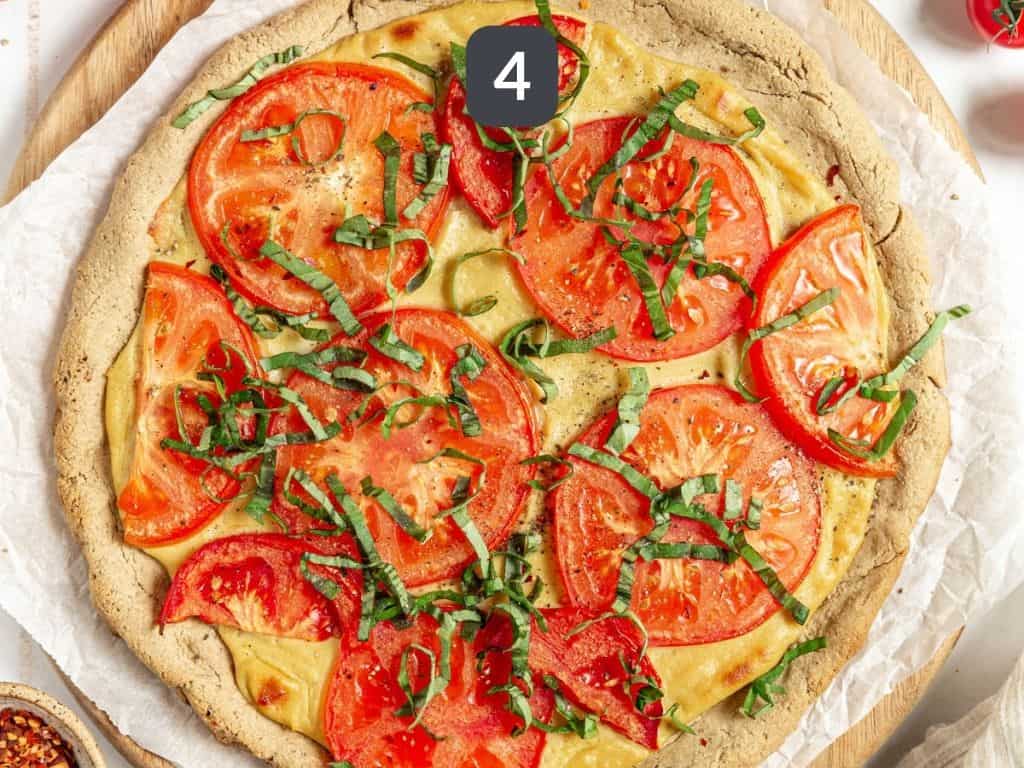 Vegan Margherita Pizza Step 4 - top with basil, red pepper flakes, and black pepper..