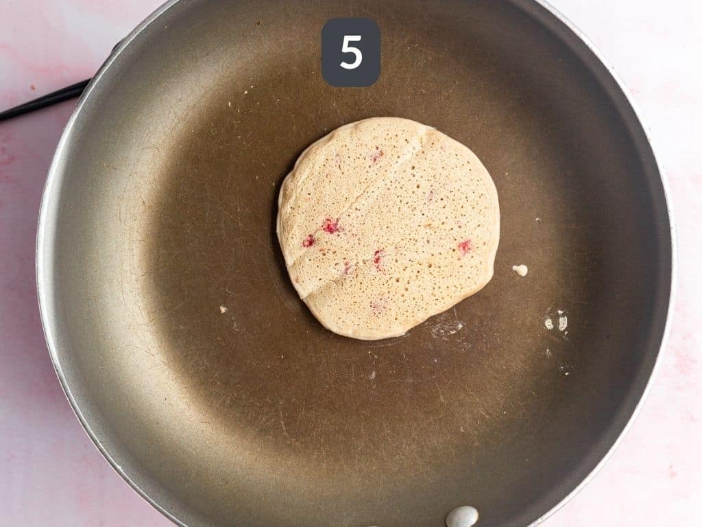 Vegan Raspberry Lemon Pancakes Step 5 - flip and cook on the other side.