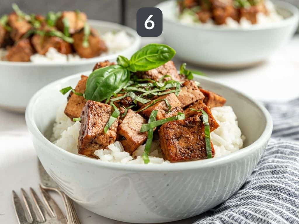 Basil Balsamic Marinated Tofu Step 6 - serve with a garnish of basil.