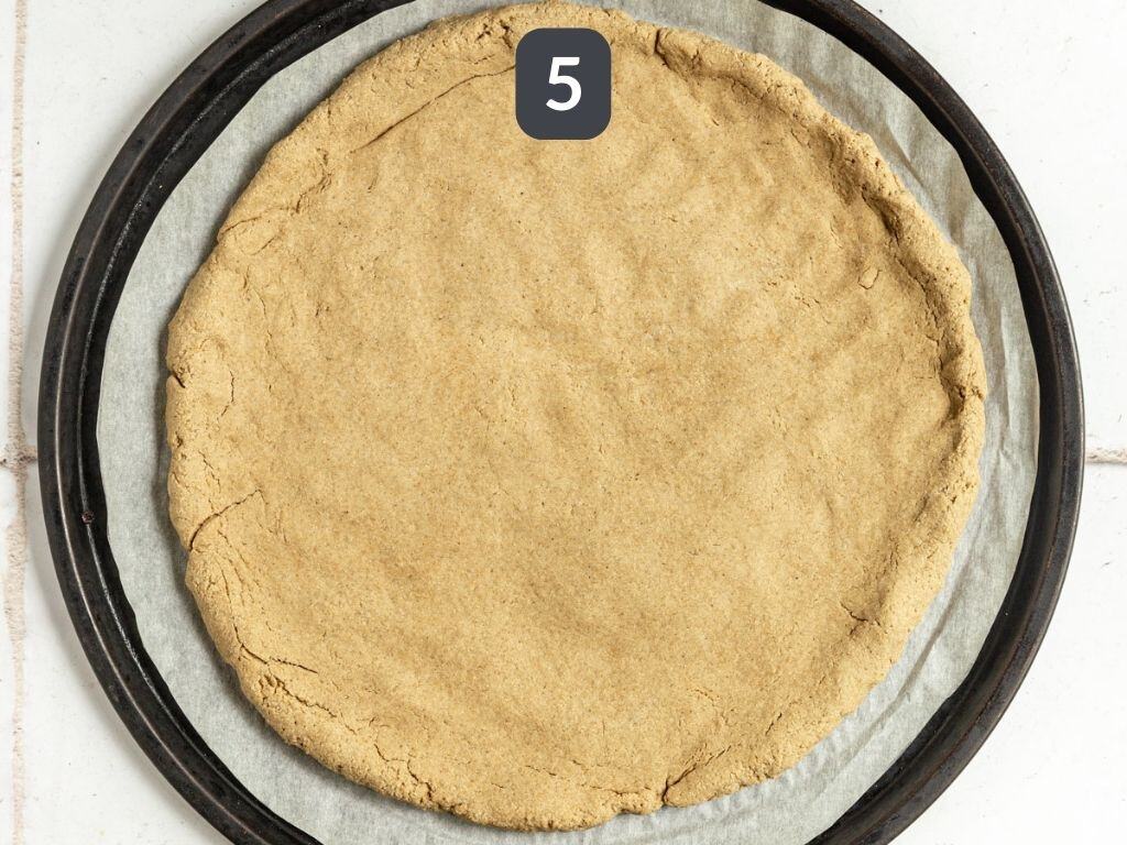 Oil-Free Vegan Oat Flour Pizza Crust Step 5 - bake until crisp.