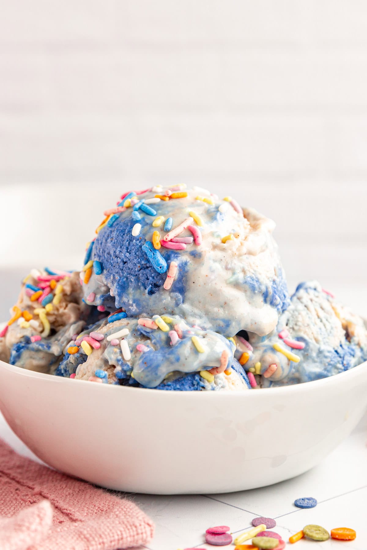 A bowl of Vegan Birthday Cake Batter Ice Cream ready to eat.