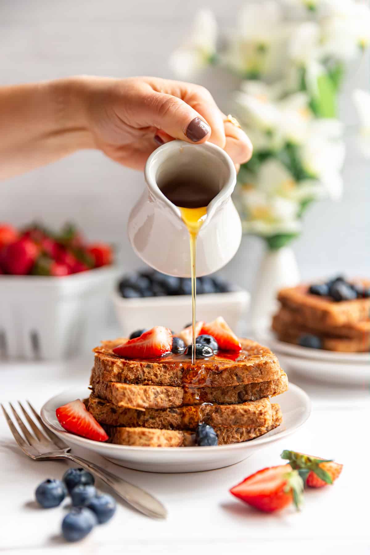 Maple syrup poured onto Vegan High Protein French Toast.