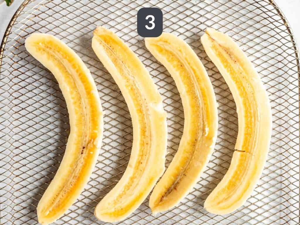 Air fryer bananas step 3 - place bananas in the air fryer.