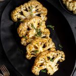 A tray of air fryer cauliflower steaks.