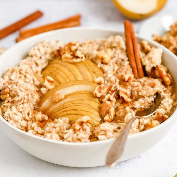 A bowl of cinnamon pear walnut oatmeal.