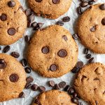 Coffee cookies on a sheet of parchment paper.