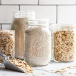 Several mason jars of homemade oat flour.