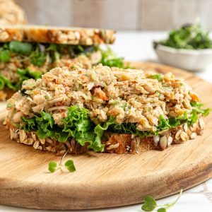 An open faced jackfruit tuna salad sandwich.