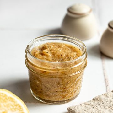 A mason jar of homemade Italian dressing.