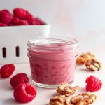A jar of oil-free raspberry vinaigrette