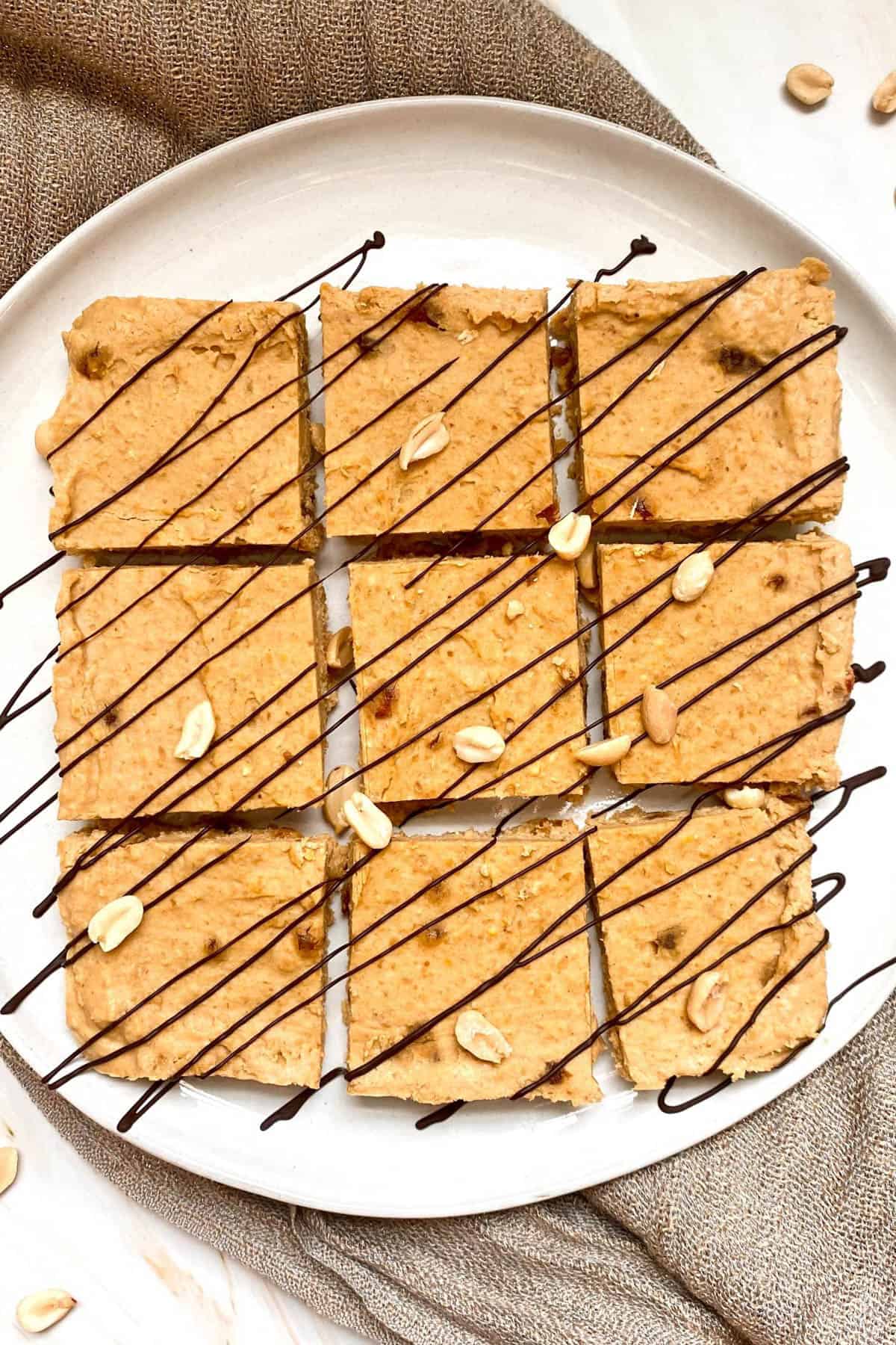 A plate of peanut butter freezer fudge cut into squares.
