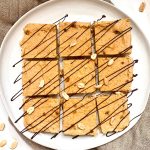 A plate of peanut butter freezer fudge cut into squares.