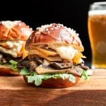 Portobello sliders served on pretzel buns.