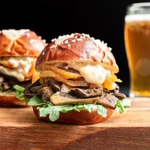 Portobello sliders served on pretzel buns.